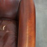 Nice sheepskin club chair with a beautiful patina