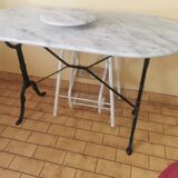 Table bistrot dessus marbre pieds fonte avec plateau tourant