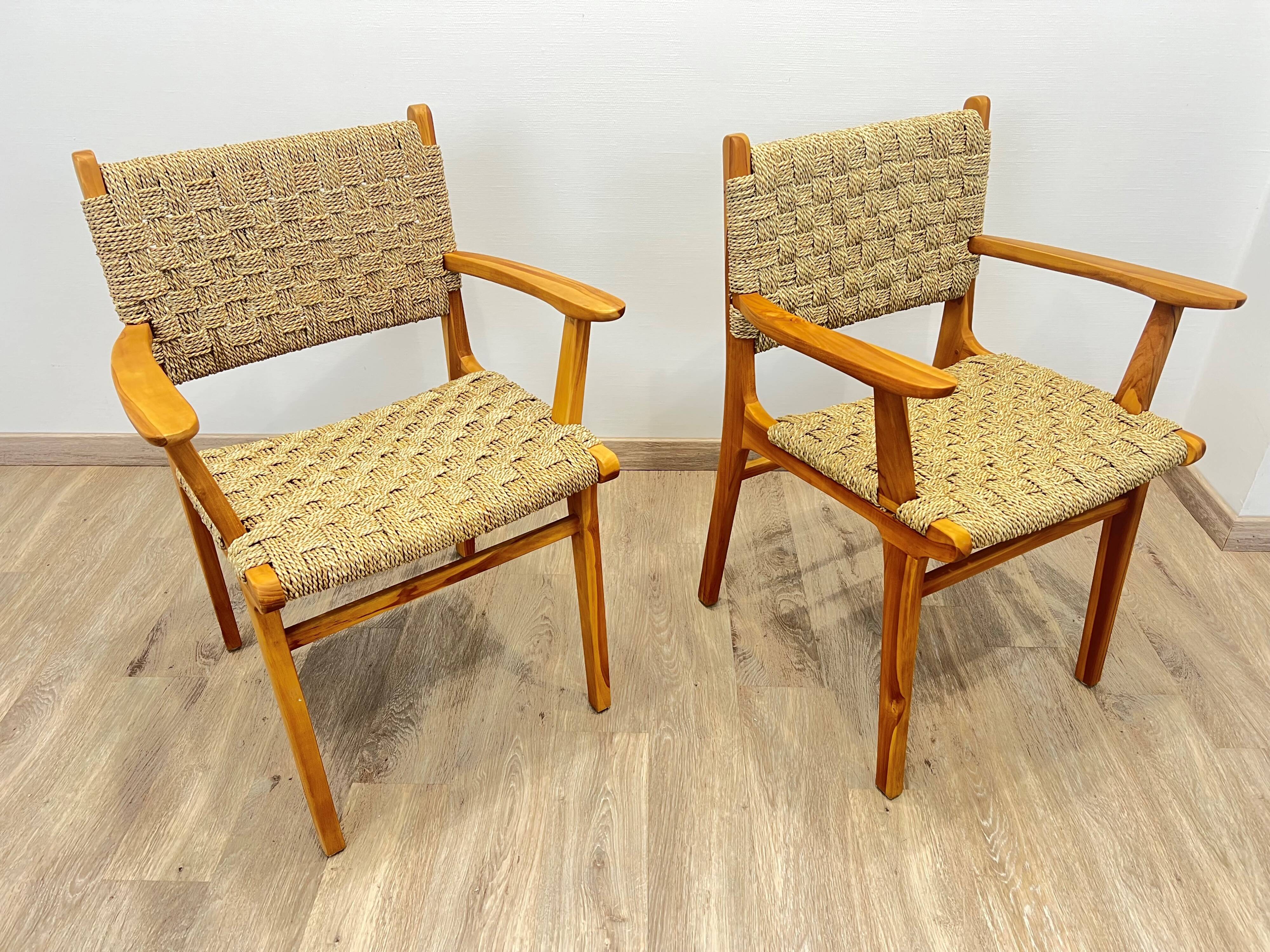 Pair of woven teak armchairs