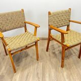 Pair of woven teak armchairs