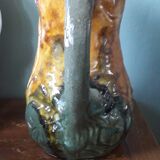 Vintage slip pitcher with floral decoration