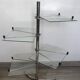 Four-tier rotating shelf in chrome metal
