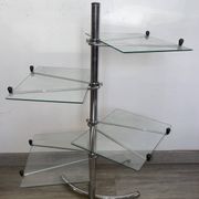 Étagère à quatre plateau orientable en métal chromé