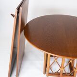 Dining table in oak with two extensions of danish design from the 1960s