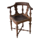 Fauteuil d'angle ancien sculpté avec assise en cuir