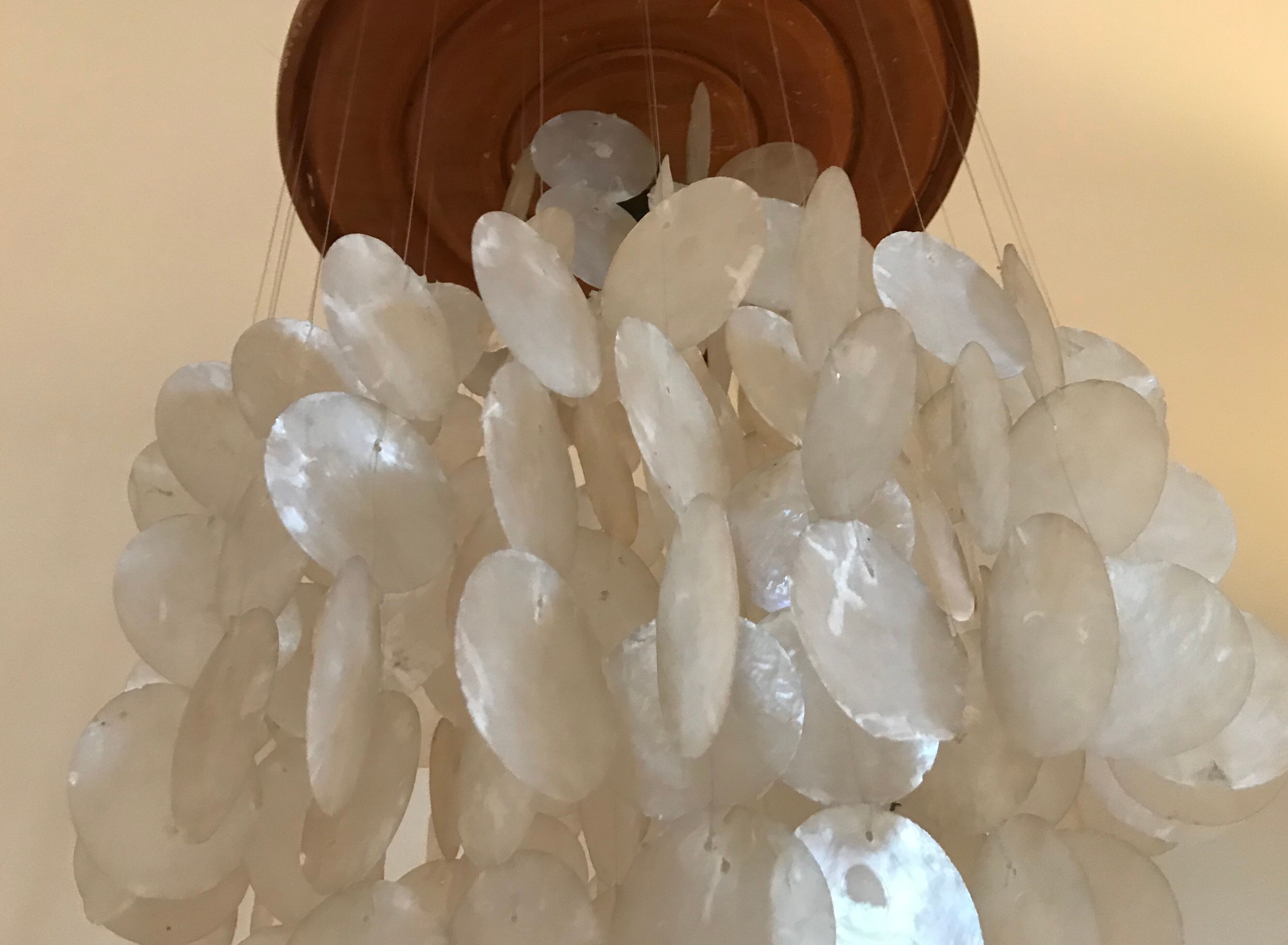 Suspension with mother-of-pearl stamps