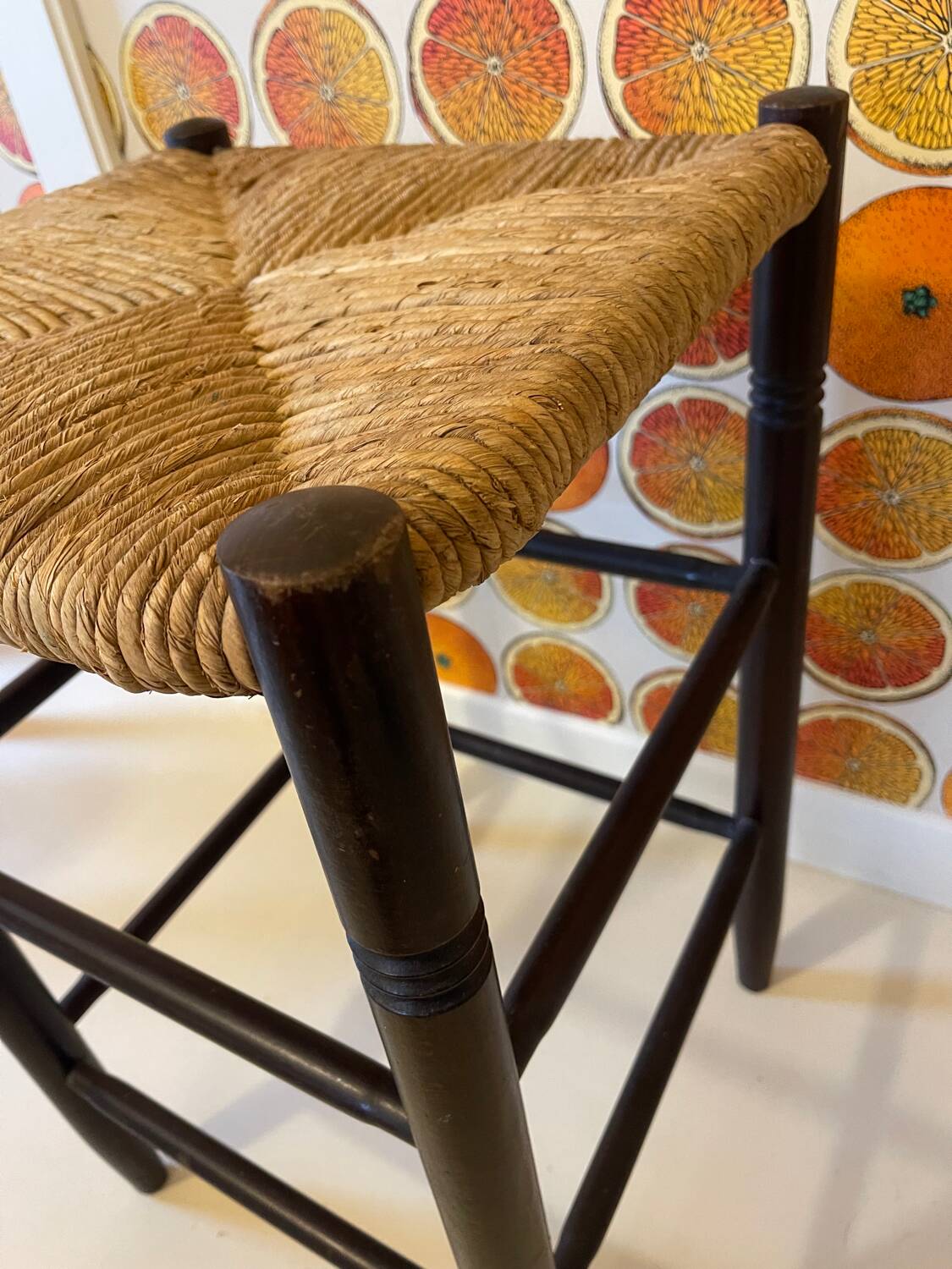 High stool made of wood and straw