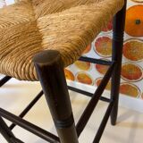 High stool made of wood and straw