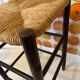 High stool made of wood and straw