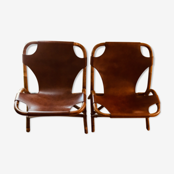 Pair of leather and bamboo armchairs