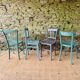 Set of four mismatched bistro chairs