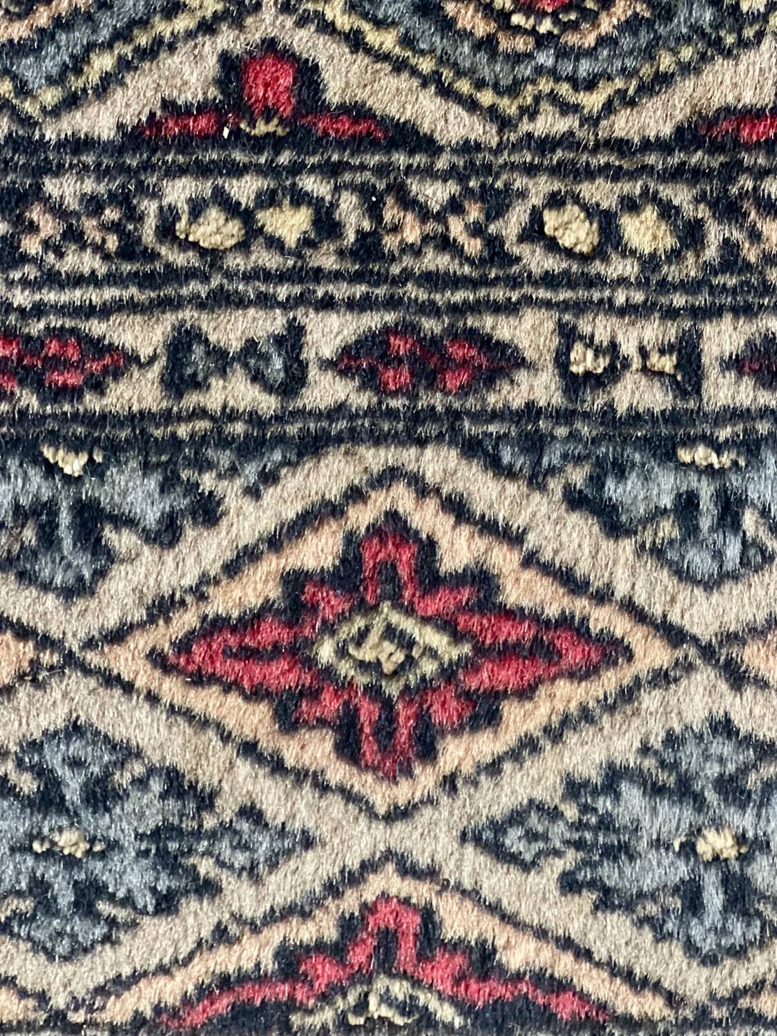 Antique Persian rug, signed.