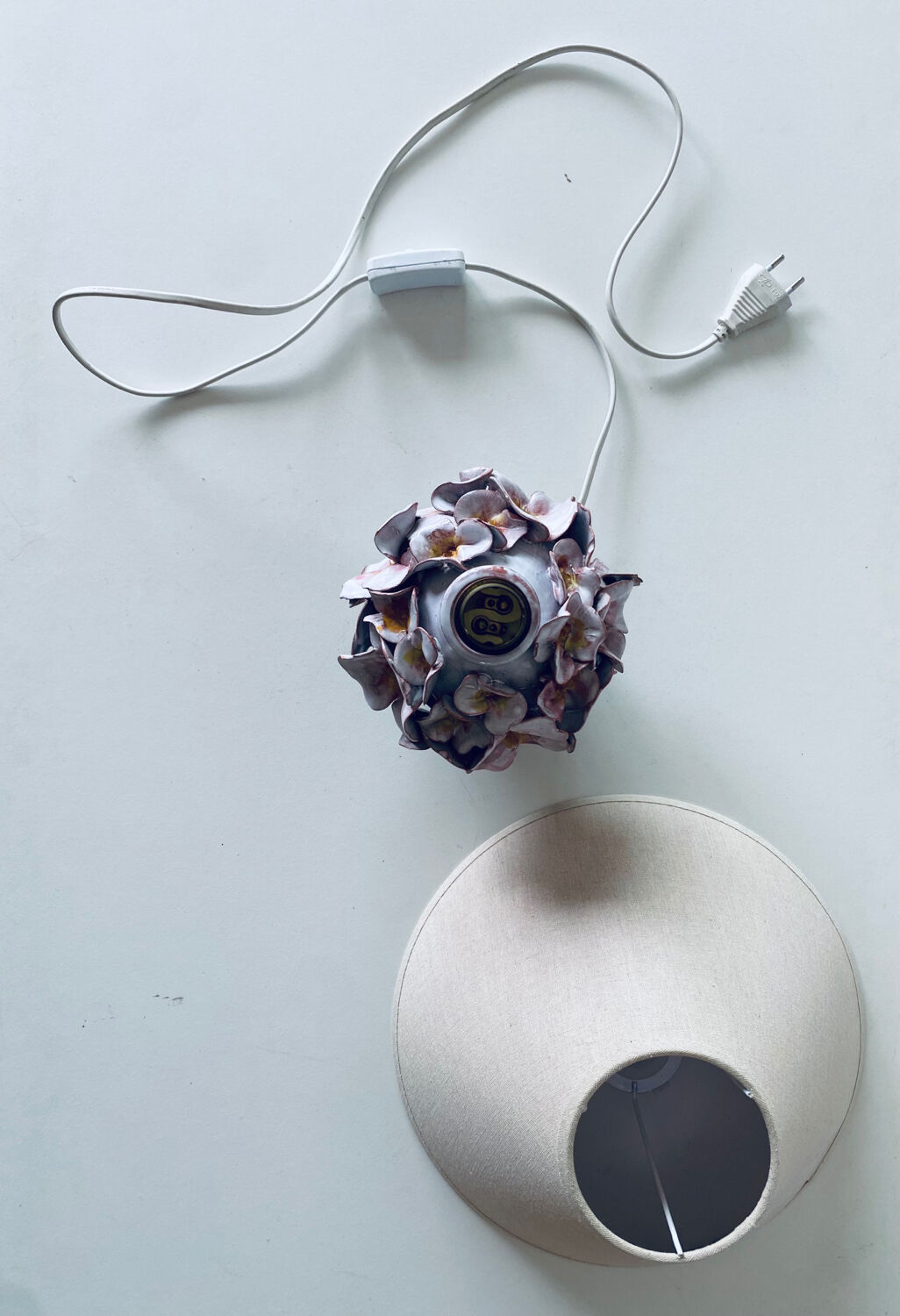 Terracotta lamp flower in relief