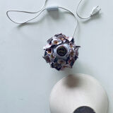 Terracotta lamp flower in relief