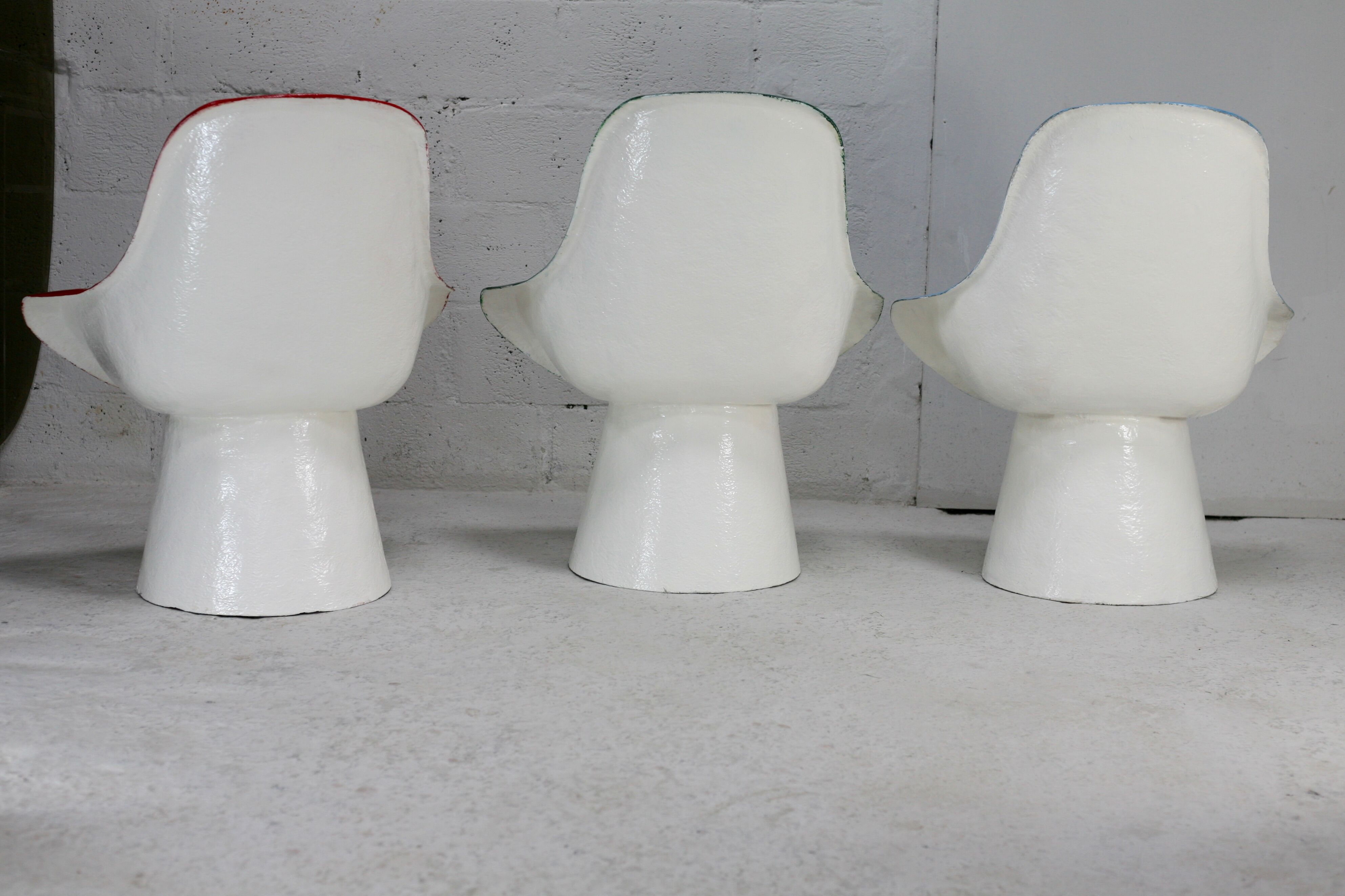 3 painted fiberglass “space age” armchairs. France, circa 1970