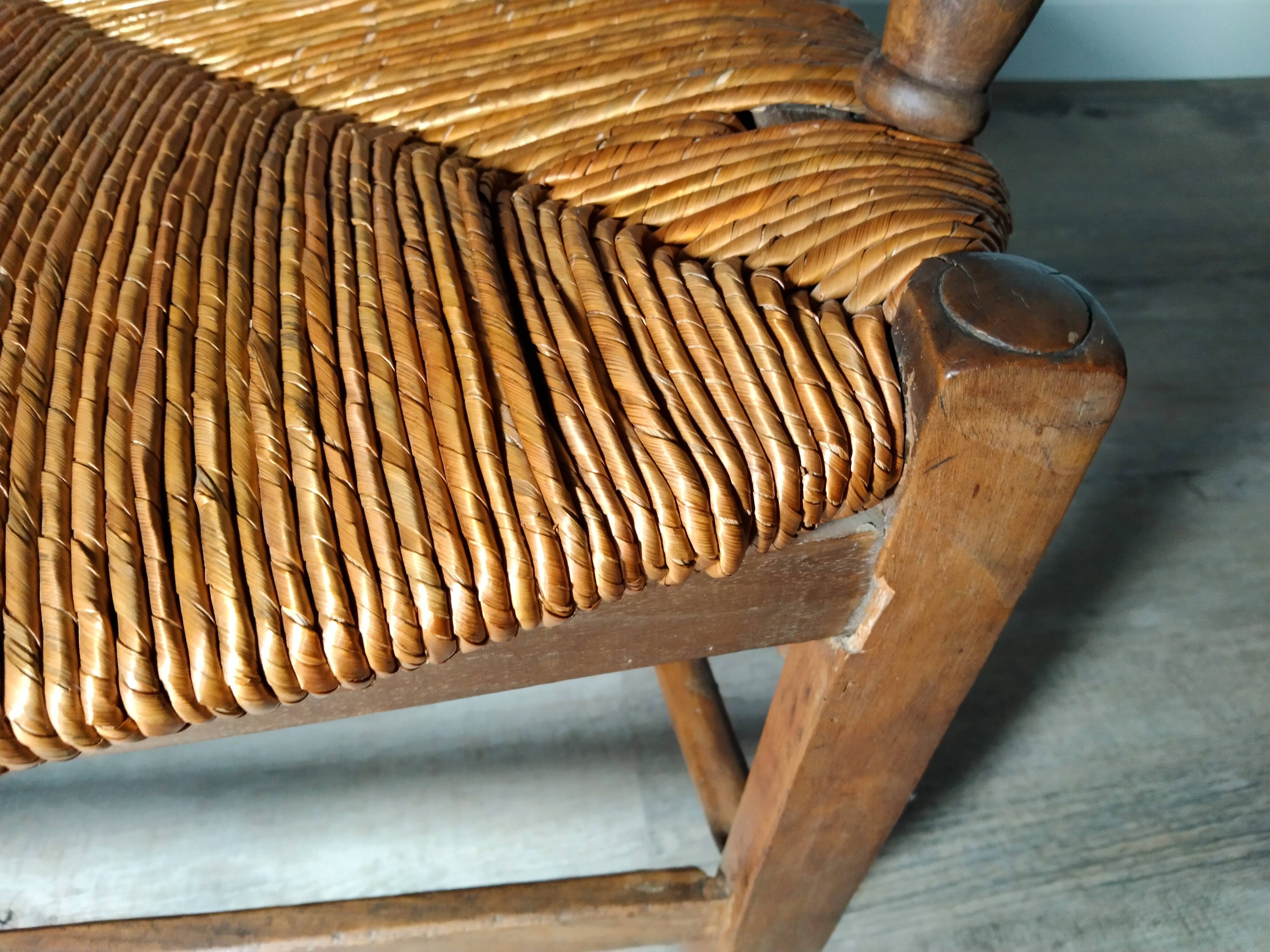 Straw armchair folk art.