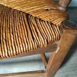 Straw armchair folk art.