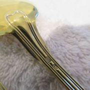 12 gold metal ice cream scoops with net decoration 14.6cm