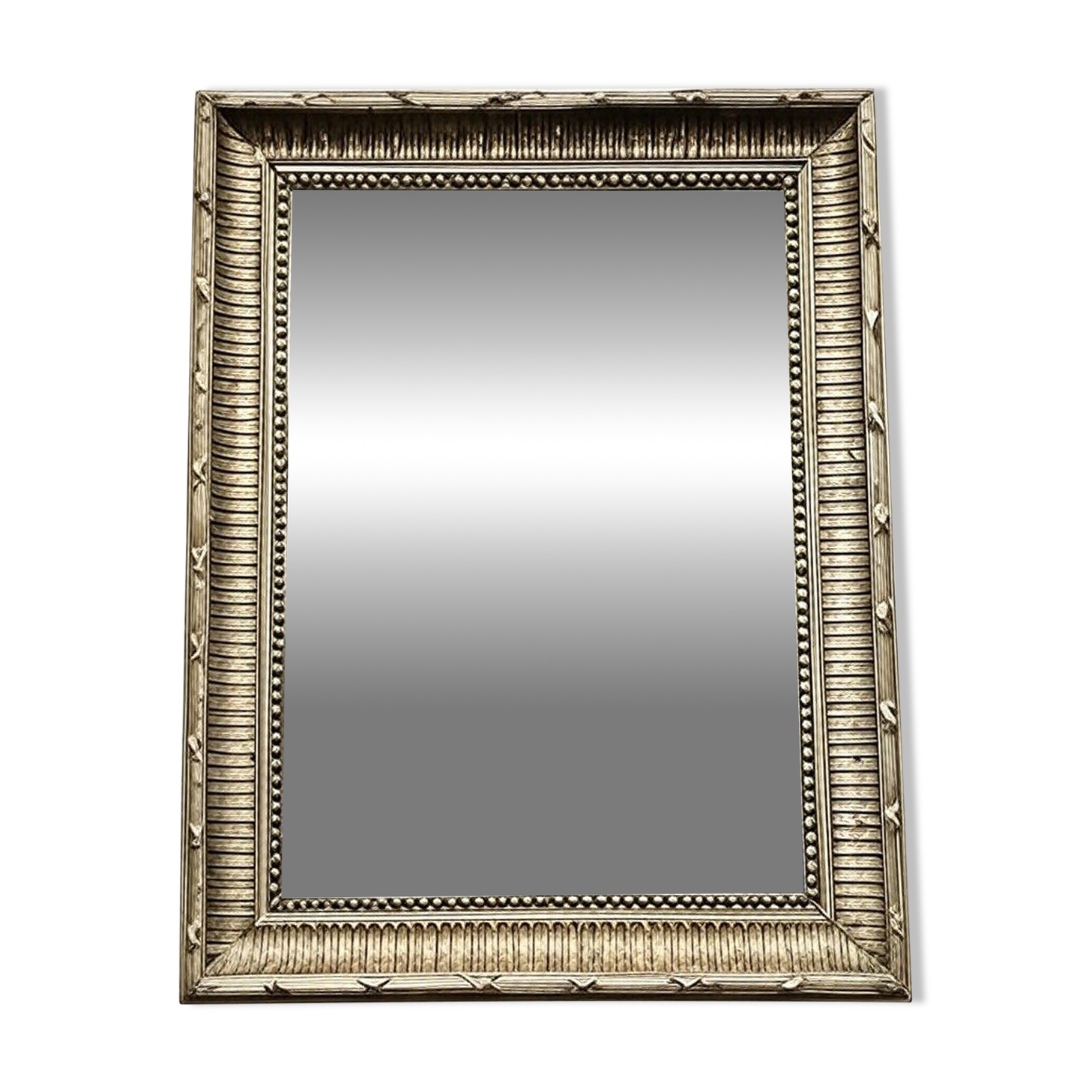 Mirror in a frame with a moulding.
