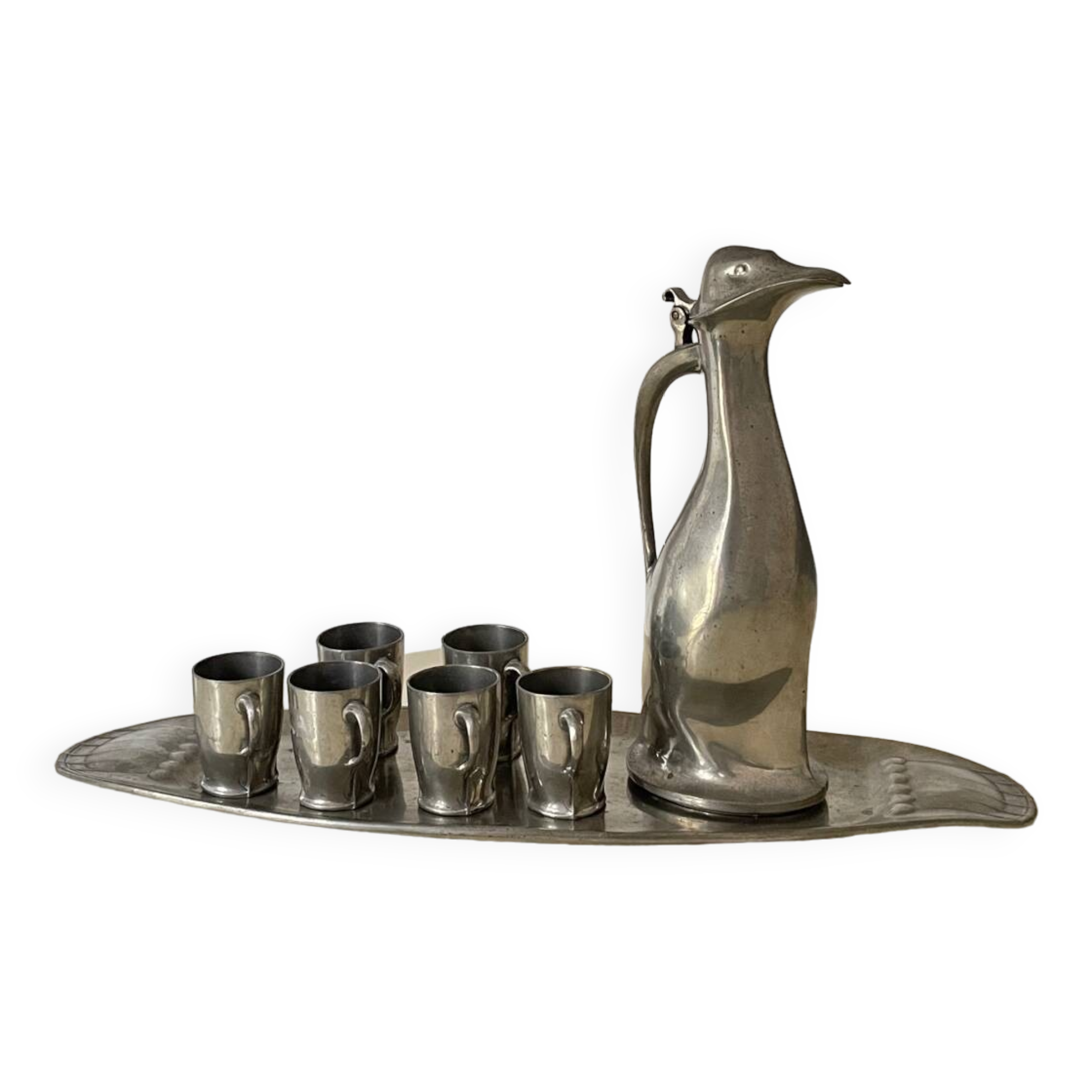 Polished pewter penguin-shaped carafe designed by Hugo Leven for Kayserzinn