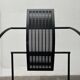 Postmodern black Quinta chair in perforated metal by Mario Botta for Alias, 1980s.
