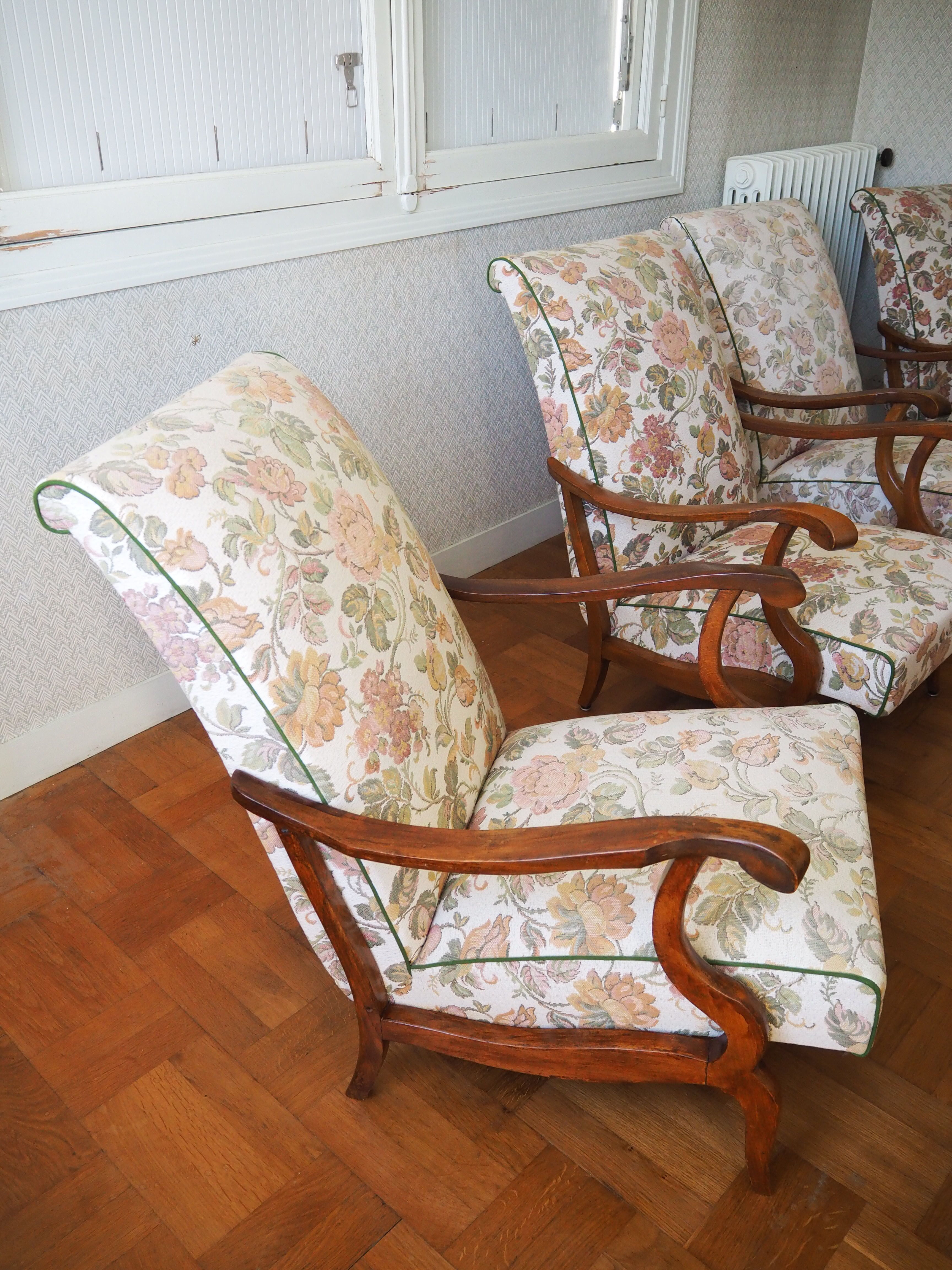 Four 1950s armchairs - wooden armrests