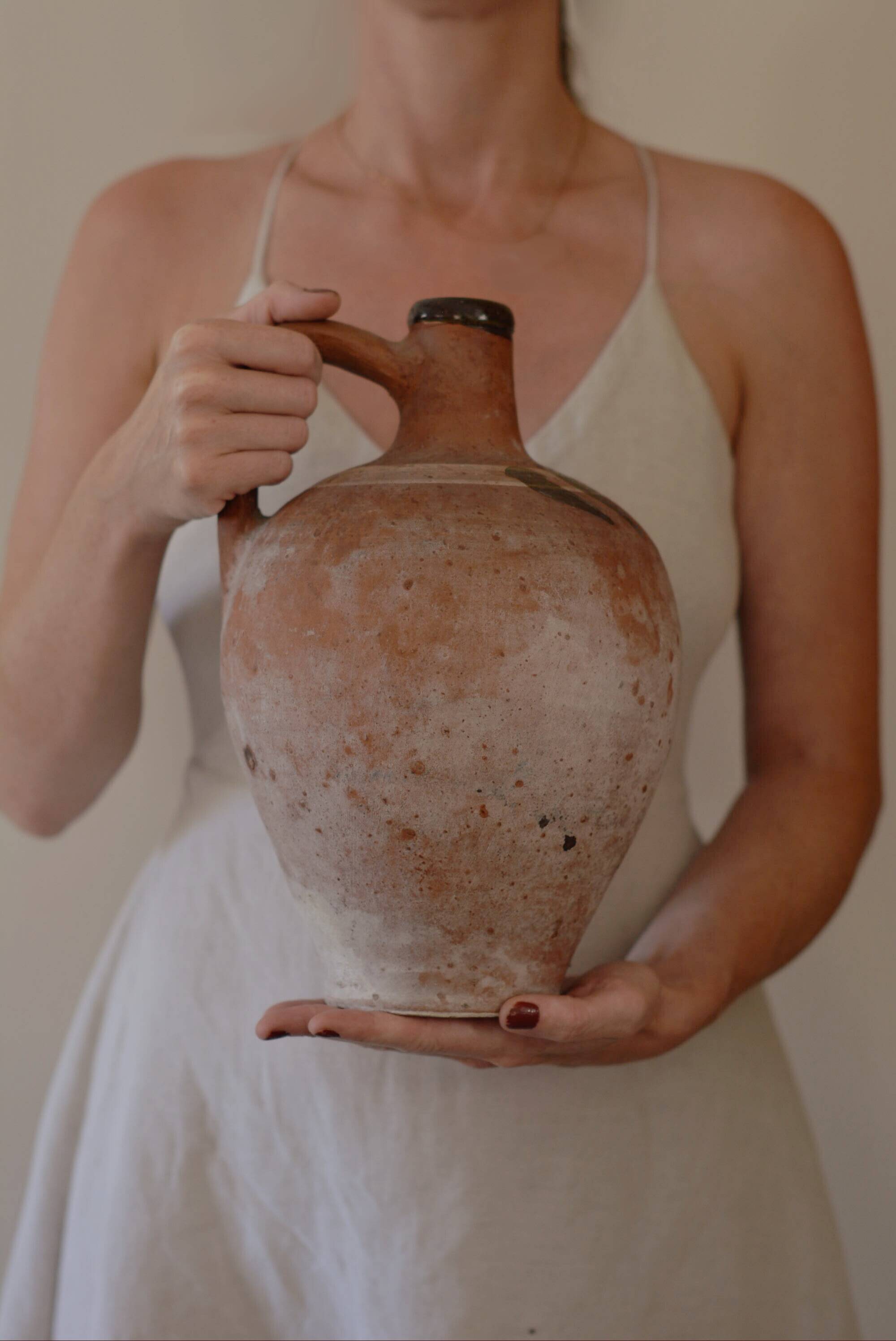 Ancient jug, terracotta pitcher from the Mediterranean.