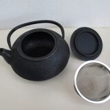 Black cast iron teapot