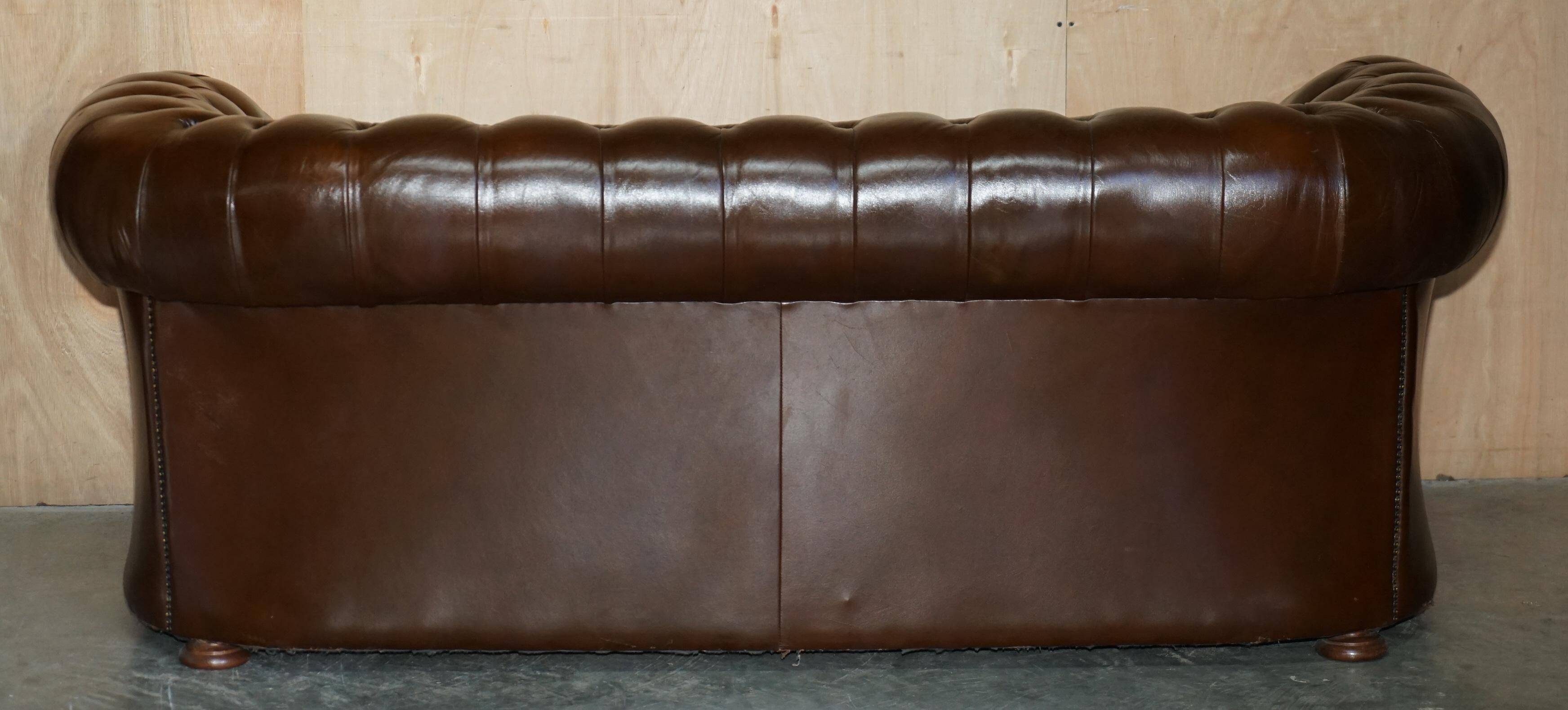 Restored Chesterfield leather sofa in vintage Art Deco style