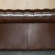 Restored Chesterfield leather sofa in vintage Art Deco style