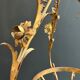 Important golden iron lantern with foliage decorations from the Baguès house.