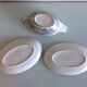 Two raviers and a white and grey cermal sauciere