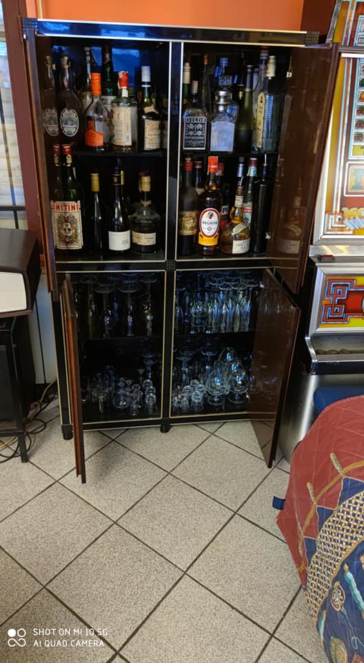Four-door cabinet in checkerboard patterned burr walnut veneer