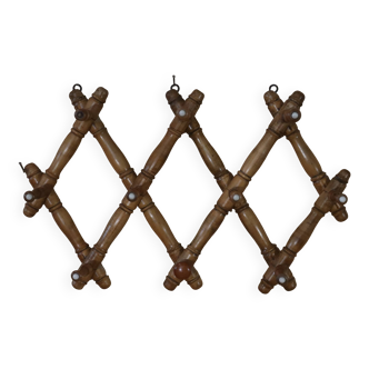 Old turned wooden wall coat rack