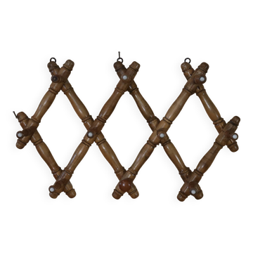 Old turned wooden wall coat rack