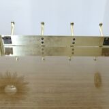Large wall-mounted coat rack in gold aluminum, 60s-70s