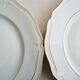 Set of 12 flat plates made of Limoges porcelain