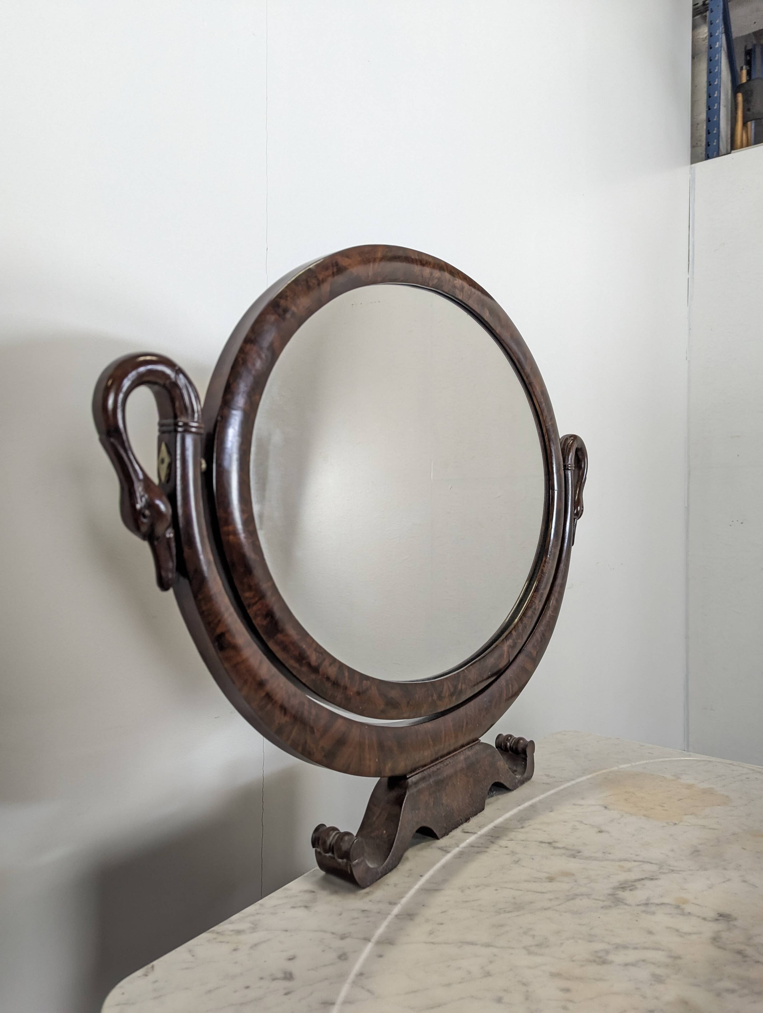 Restoration period flamed mahogany swan neck dressing table