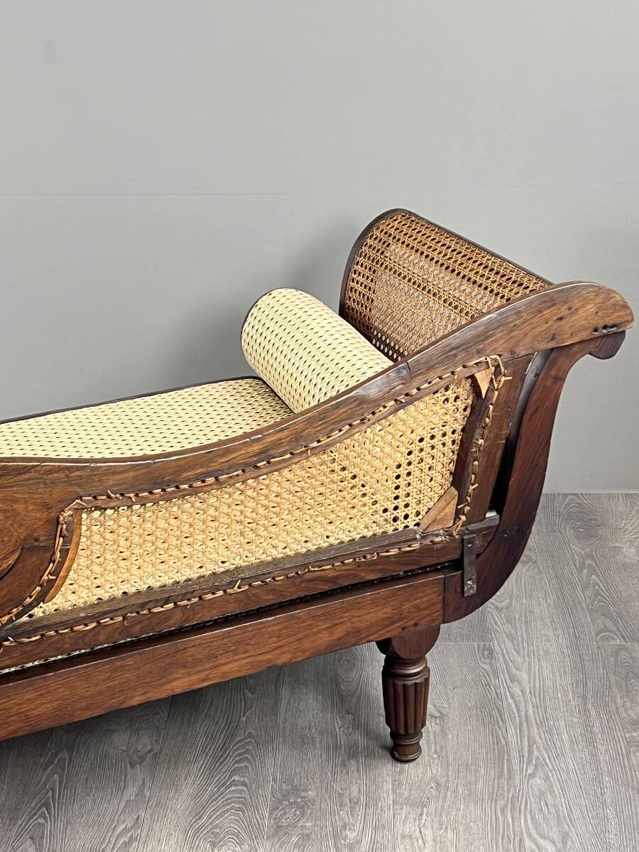 Louis XVI style meridian in carved wood and caning, 19th century.