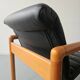Pair of vintage Flototto armchairs in leather and wood, 1980s.