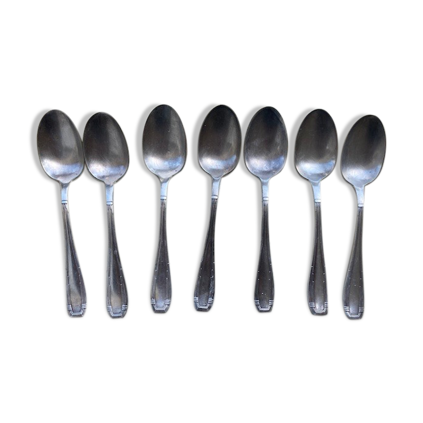 7 cuillères à soupe en métal argenté