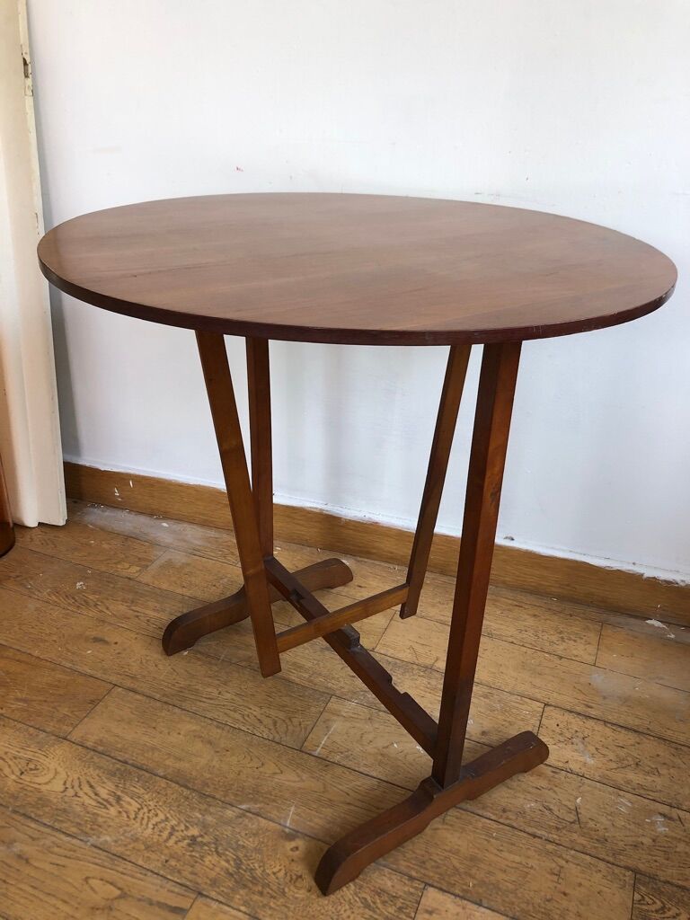 A folding table in cherry tree called a winemaker