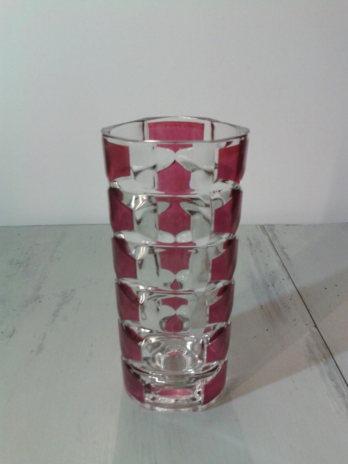 Thick red faceted glass vase