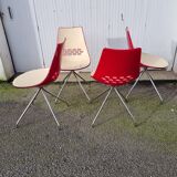 Guzzini dining set, round glass table and 4 shell chairs.