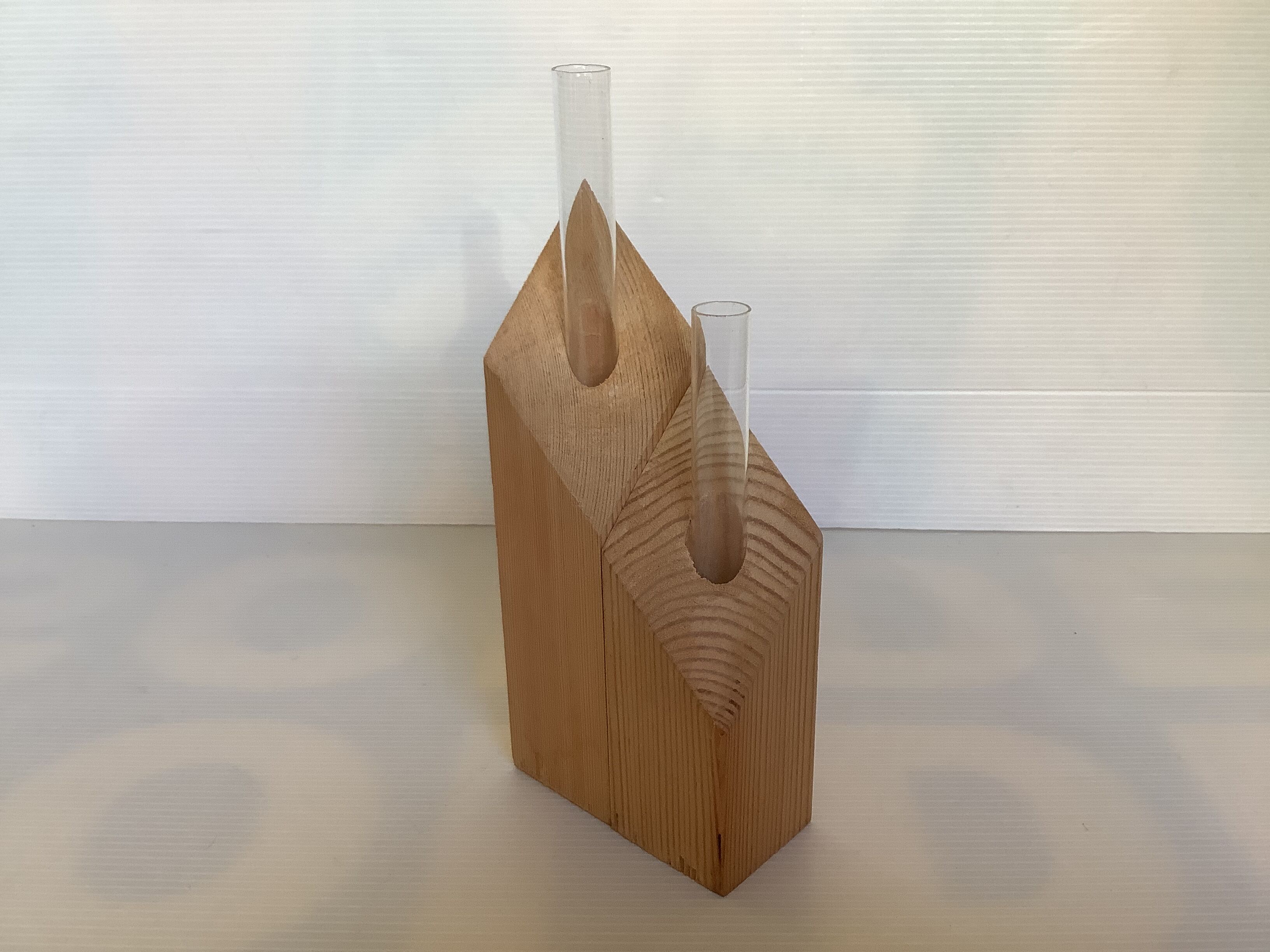 Pair of diamond-shaped wooden Scandinavian test tube vases.