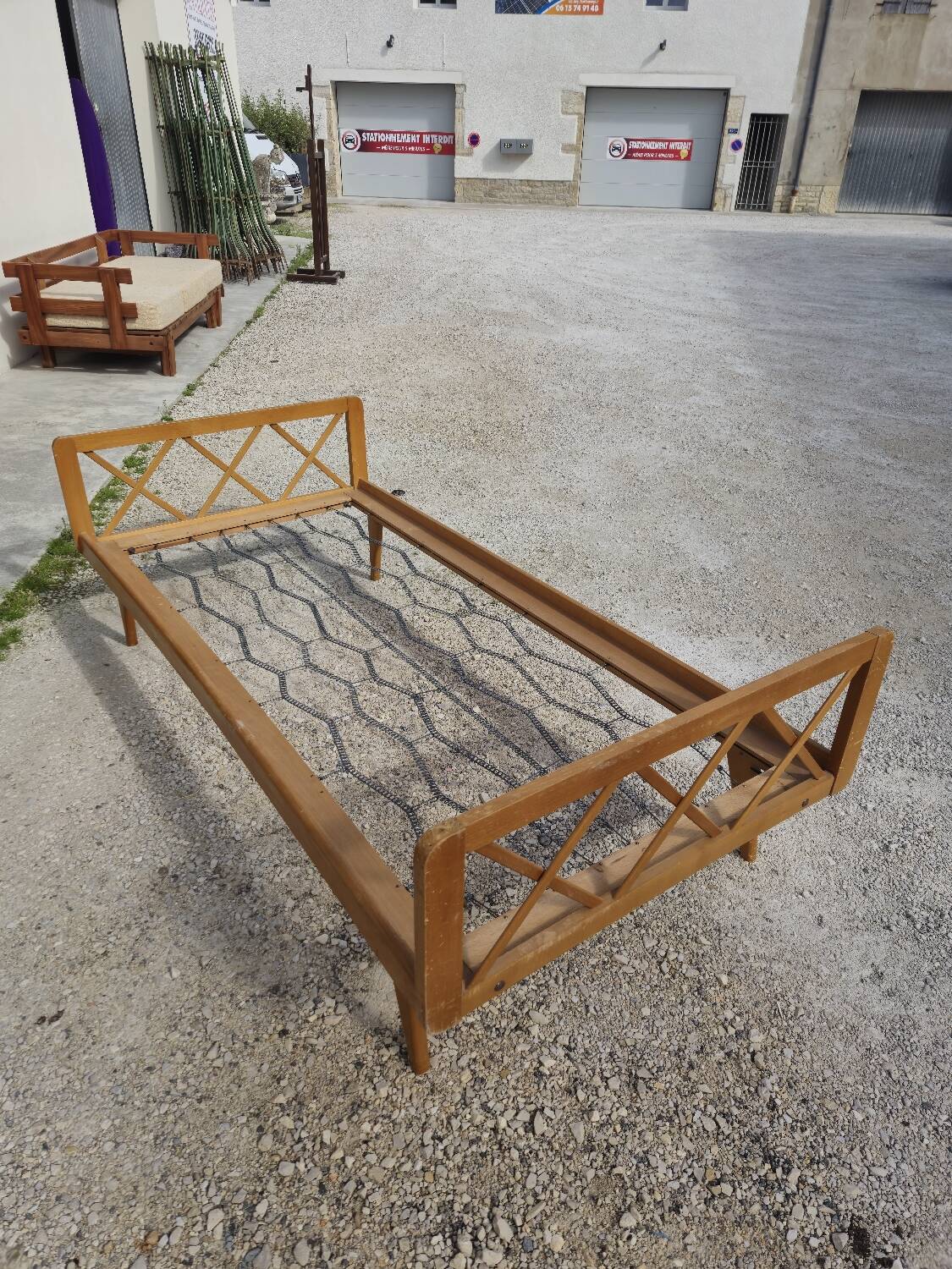 Vintage bed with compass feet from the 1950s