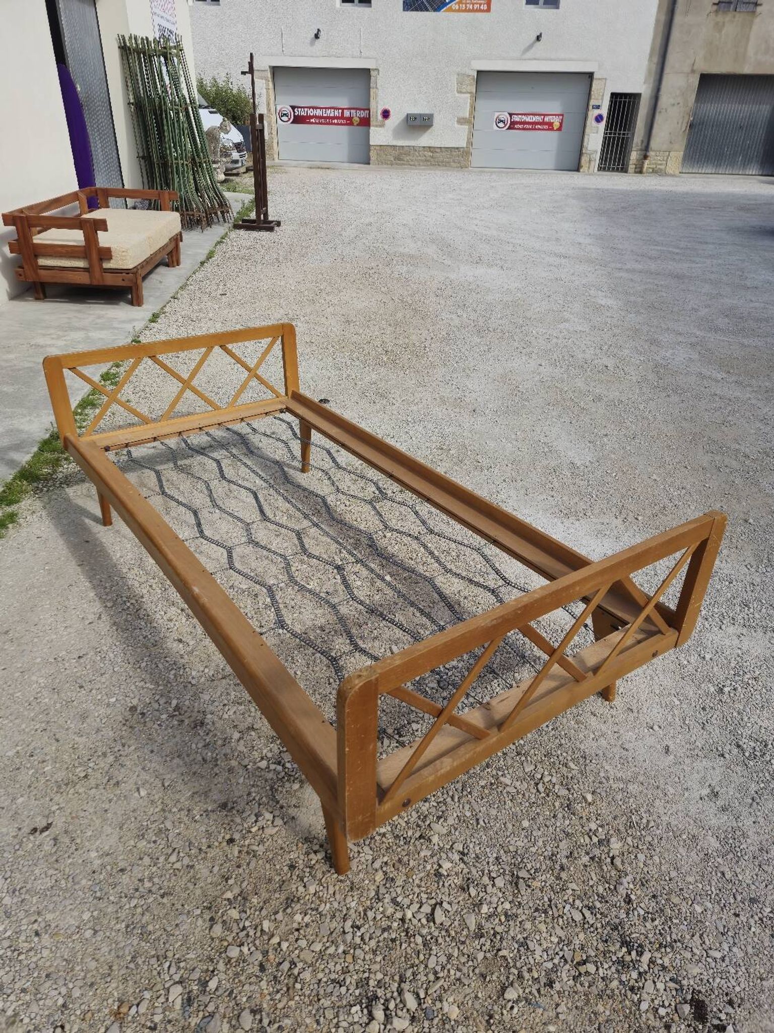 Vintage bed with compass feet from the 1950s
