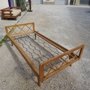 Vintage bed with compass feet from the 1950s