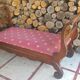 Empire style curved bench