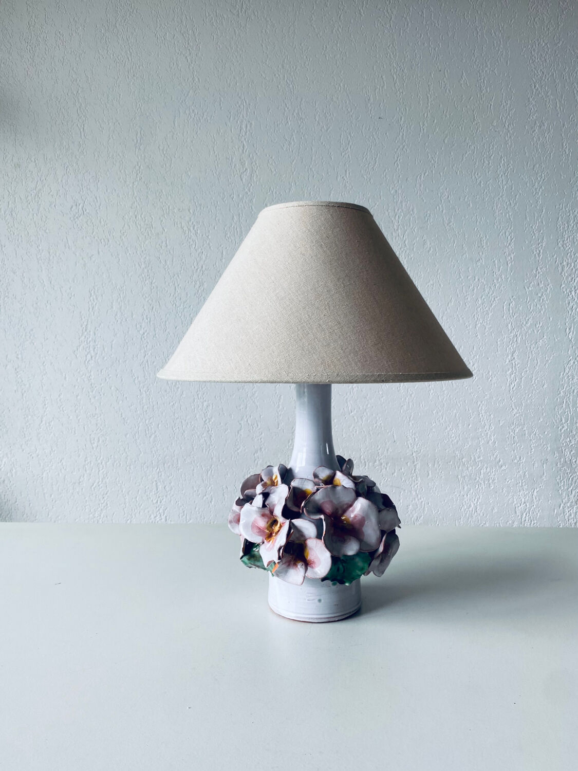 Terracotta lamp flower in relief